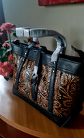Borsa in pelle di vacchetta con primo strato scheletro intagliata a mano modello Eris Favolosa