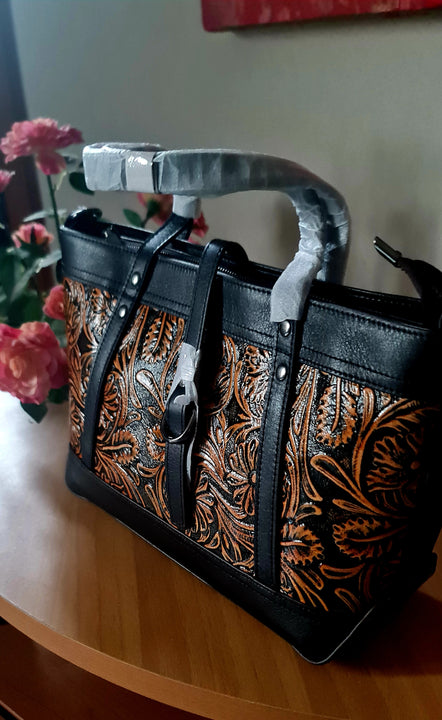 Borsa in pelle di vacchetta con primo strato scheletro intagliata a mano modello Eris Favolosa