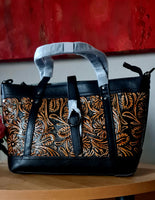 Borsa in pelle di vacchetta con primo strato scheletro intagliata a mano modello Eris Favolosa