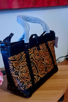 Borsa in pelle di vacchetta con primo strato scheletro intagliata a mano modello Eris Favolosa
