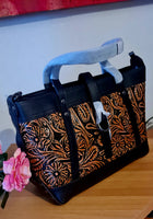 Borsa in pelle di vacchetta con primo strato scheletro intagliata a mano modello Eris Favolosa