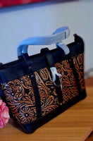 Borsa in pelle di vacchetta con primo strato scheletro intagliata a mano modello Eris Favolosa