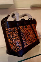 Borsa in pelle di vacchetta con primo strato scheletro intagliata a mano modello Eris Favolosa