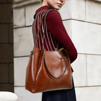 Borsa a secchiello sub-diagonale di grande capacità 4 in 1 borsa da donna retrò modello nilla nero marrone wine red MAHENA ECONOMY