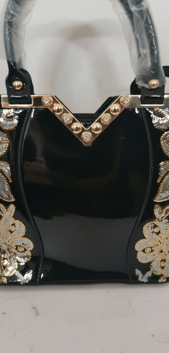 Matilde Lounge Beautiful!!! Shiny embroidered PU shoulder bag with golden flowers, black or red.