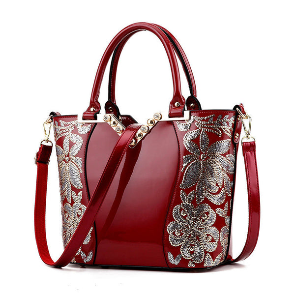 Matilde Lounge Beautiful!!! Shiny embroidered PU shoulder bag with golden flowers, black or red.